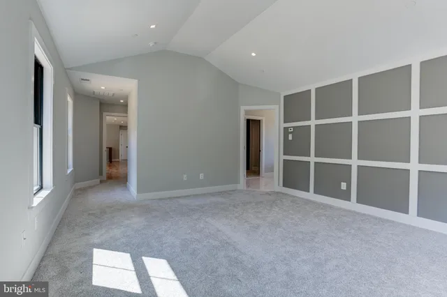 an empty room with a natural light