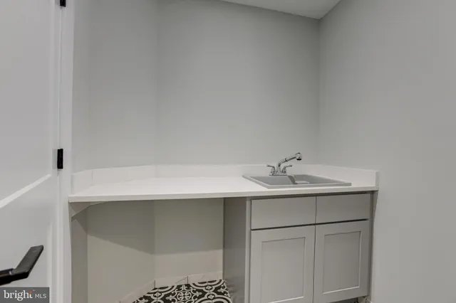 a sink with a cabinet