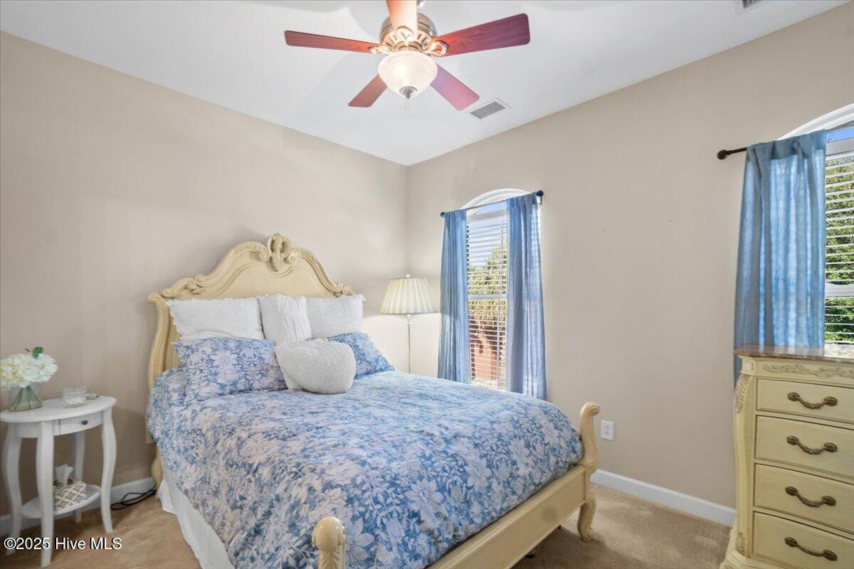 7650 Front Street, Unit 3 Sunset Beach, NC 28468 - Photo 18 of 37 Primary Suite