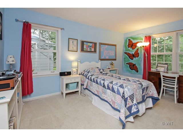 1460 Edgewood Road Lake Forest, IL 60045 - Photo 15 of 21 a bedroom with a bed a dresser next to a window