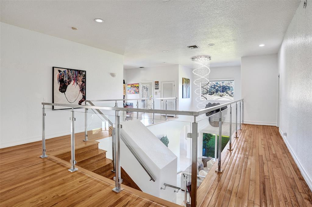3061 Southwest 117th Avenue Davie, FL 33330 - Photo 45 of 83 a view of a hallway with wooden floor and staircase