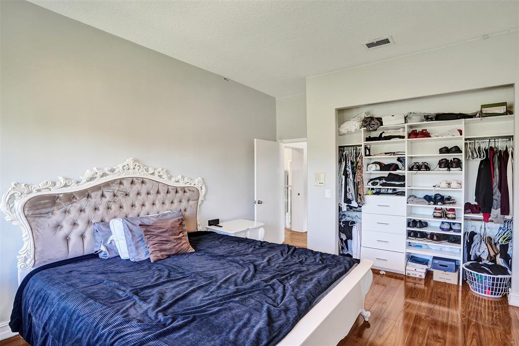 3061 Southwest 117th Avenue Davie, FL 33330 - Photo 50 of 83 a bedroom with a bed and a walk in closet