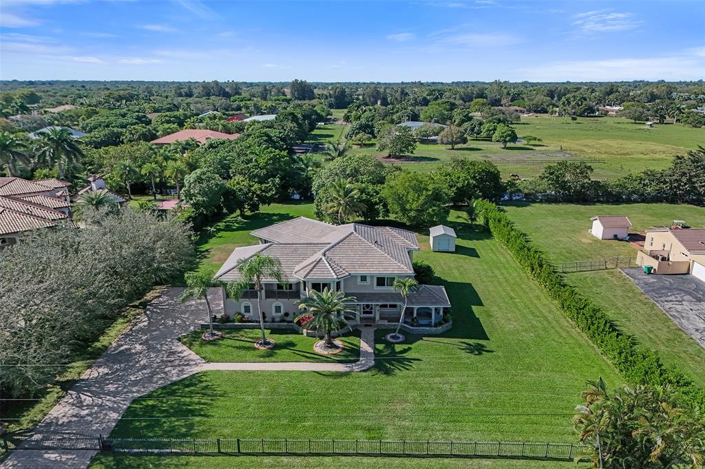 3061 Southwest 117th Avenue Davie, FL 33330 - Photo 66 of 83 an aerial view of a house with garden space and street view