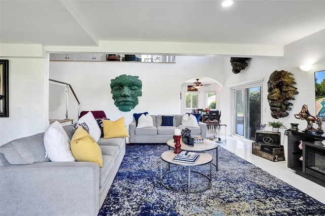 a living room with furniture and a table