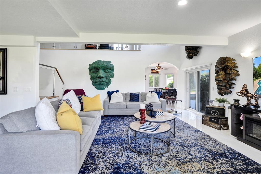 3061 Southwest 117th Avenue Davie, FL 33330 - Photo 8 of 83 a living room with furniture and wooden floor