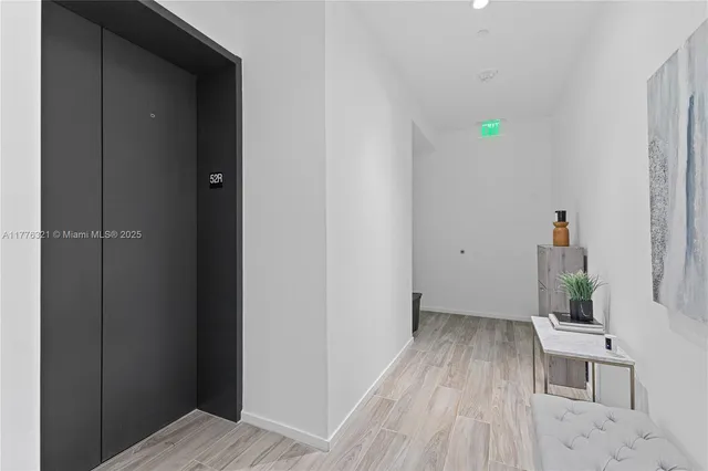 a view of a swimming pool with furniture