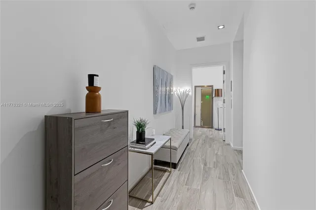 a view of swimming pool with outdoor seating and plants