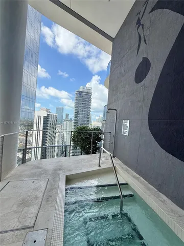 a outdoor space with lots of white furniture
