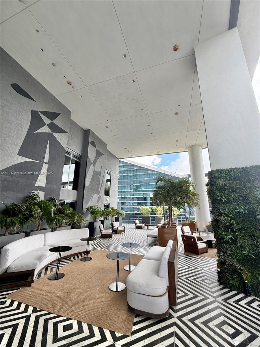 801 South Miami Avenue, Unit 5209 Miami, FL 33131 - Photo 43 of 43 a outdoor space with lots of white furniture