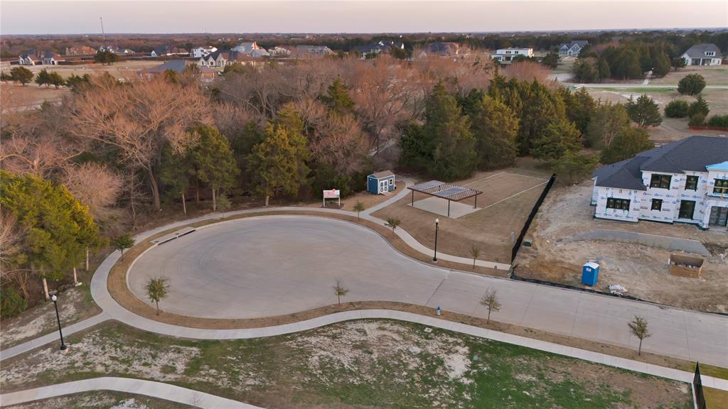 4810 Azalea Way Midlothian, TX 76065 - Photo 8 of 13 an aerial view of a house with yard and lake view
