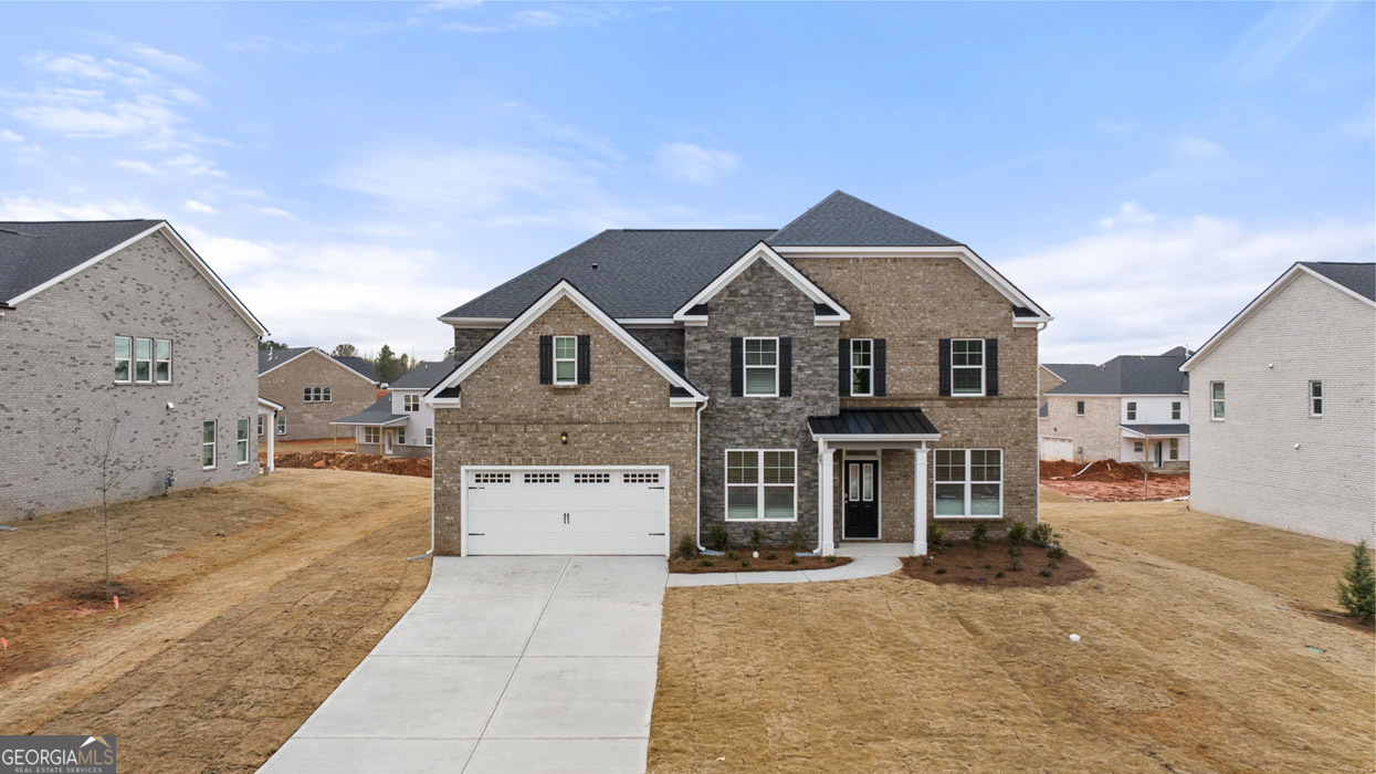 690 Edgar Street Hampton, GA 30228 - Photo 1 of 1 a front view of a house with a yard