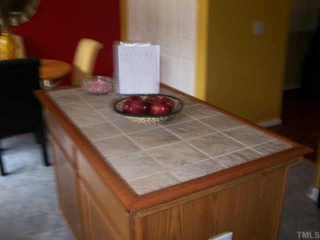 3404 Sosa Road Raleigh, NC 27610 - Photo 3 of 10 Nice kitchen with black appliances..perfect for entertaining Other