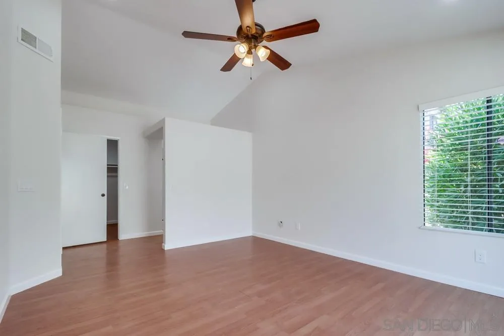 10310 Lake Ridge Court Spring Valley, CA 91977 - Photo 20 of 37 a view of empty room with wooden floor and fan