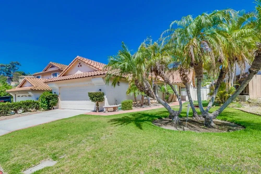 10310 Lake Ridge Court Spring Valley, CA 91977 - Photo 3 of 37 a view of a house with a yard and sitting area