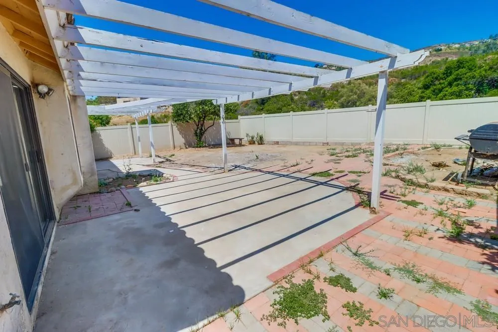 10310 Lake Ridge Court Spring Valley, CA 91977 - Photo 32 of 37 a view of a backyard of a house