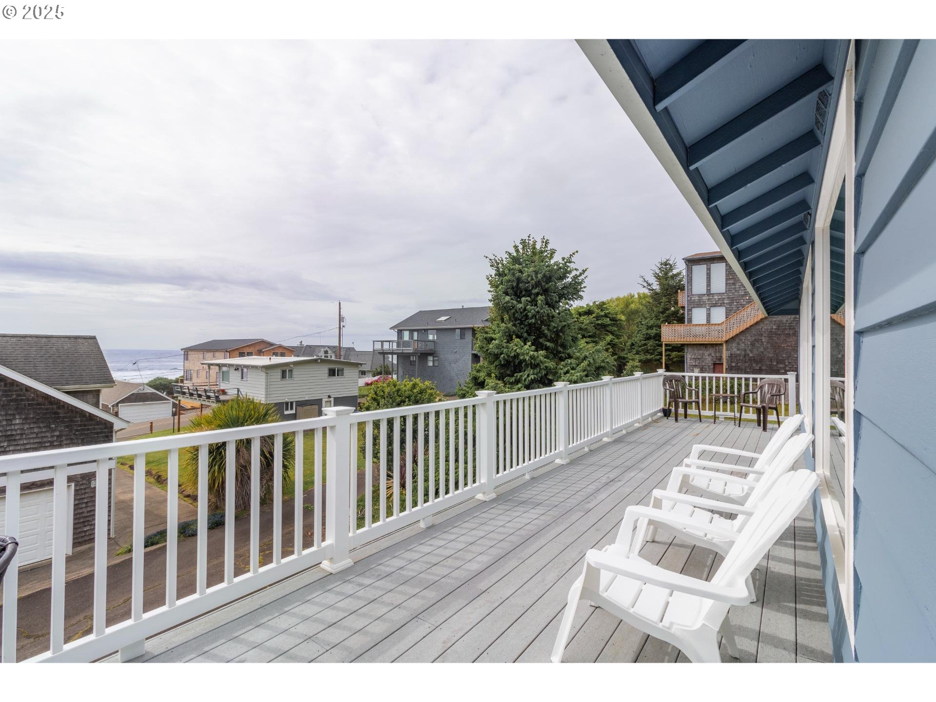 7495 Northeast Neptune Drive Lincoln City, OR 97367 - Photo 25 of 35 a view of balcony with wooden floor