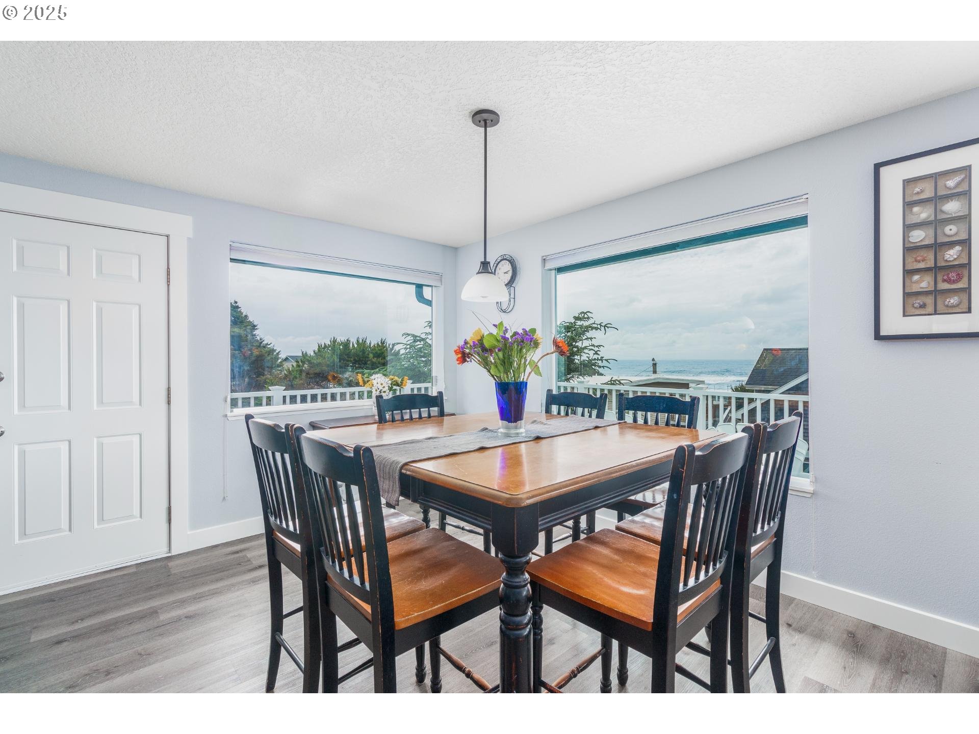 7495 Northeast Neptune Drive Lincoln City, OR 97367 - Photo 8 of 35 a dining room with furniture and window