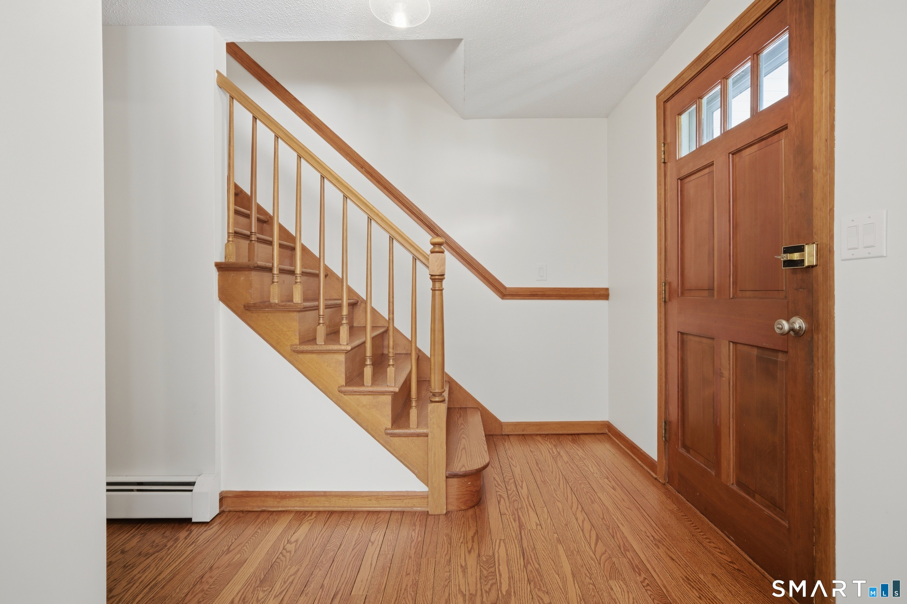 211 Valley View Road Manchester, CT 06040 - Photo 4 of 39 a view of an entryway with wooden floor