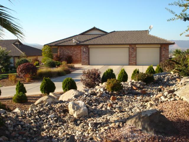 686 West Windsor Drive St. George, UT 84770 - Photo 1 of 1 Nice long driveway, perfect parking for guest.