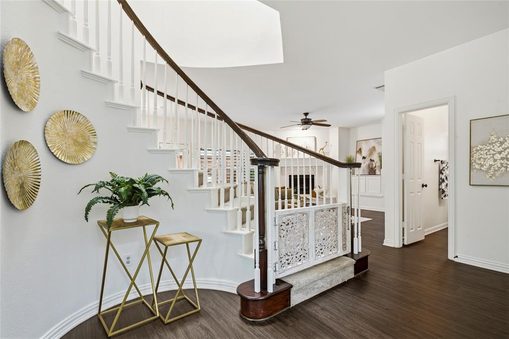 5201 Geode Lane McKinney, TX 75072 - Photo 6 of 37 Home features stunning architectural curved walls. throughout. Gate has been removed at bottom of staircase.