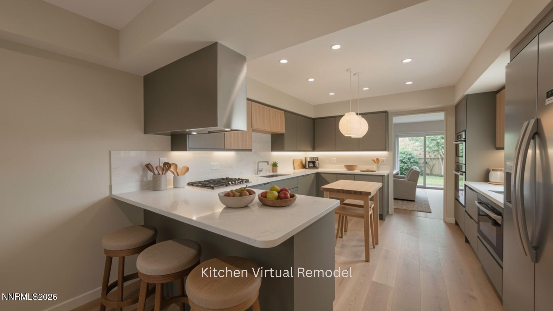 4920 Plumas Street Reno, NV 89509 - Photo 3 of 36 a kitchen with a sink stainless steel appliances and view living room