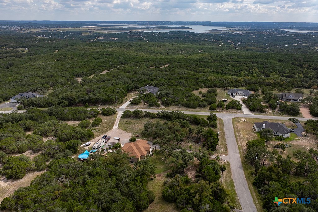861 Rutherford Fischer, TX 78623 - Photo 4 of 38 Aerial showing proximity to Canyon Lake. Corner lot for sale as well.