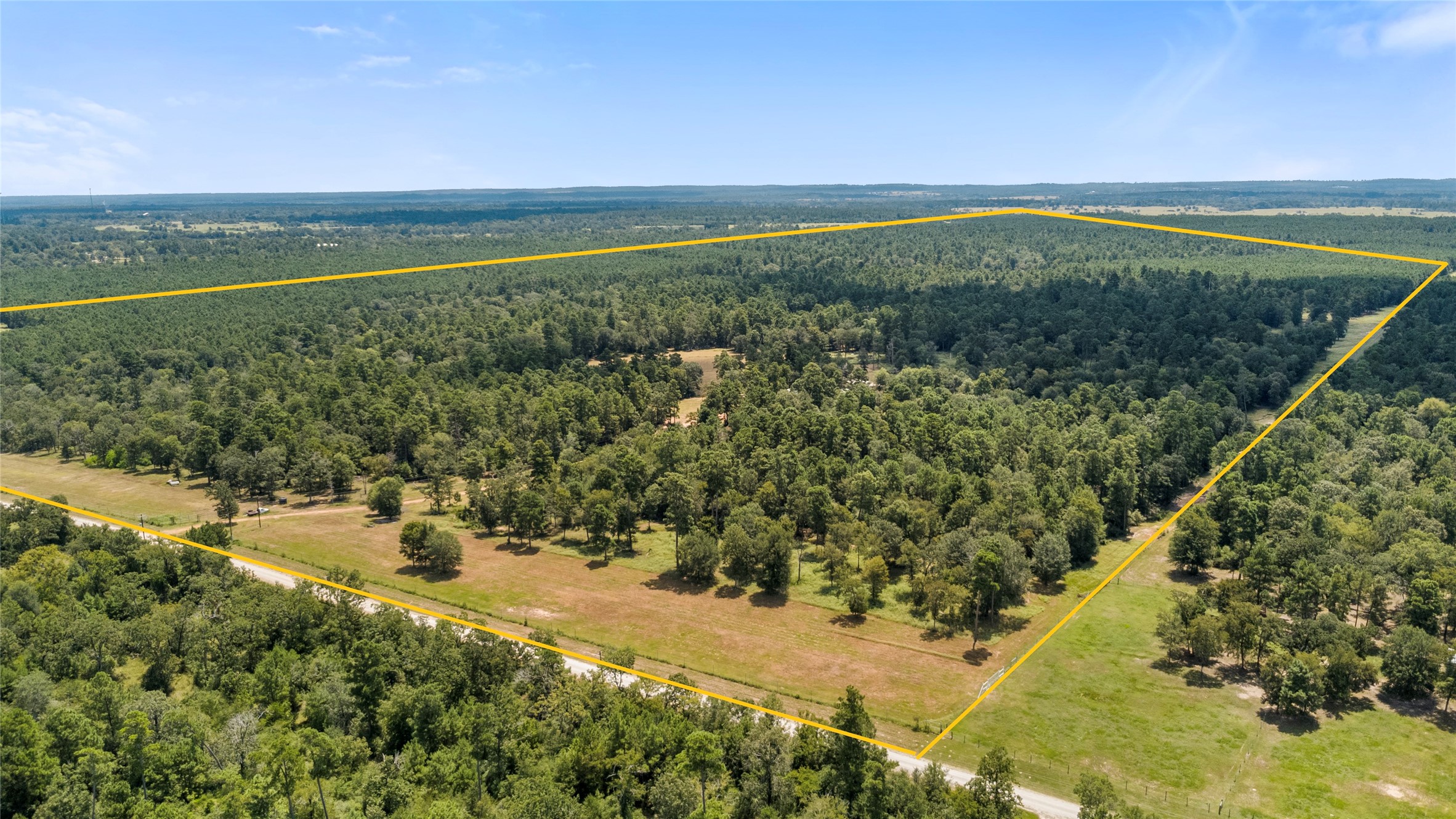 235 Flynt Road Huntsville, TX 77320 - Photo 1 of 25 a view of a city with an ocean