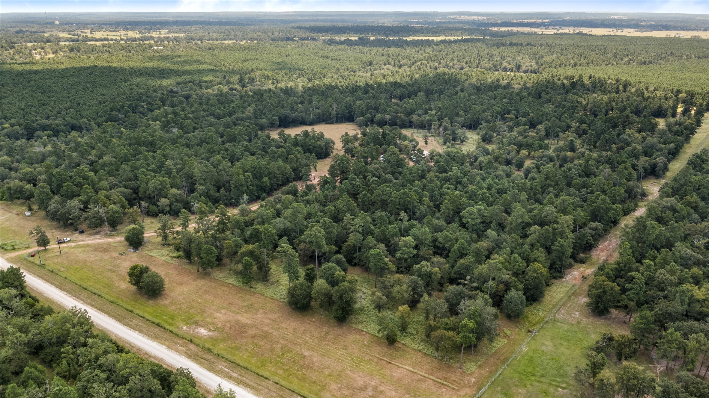 235 Flynt Road Huntsville, TX 77320 - Photo 12 of 25 a view of a city from a yard