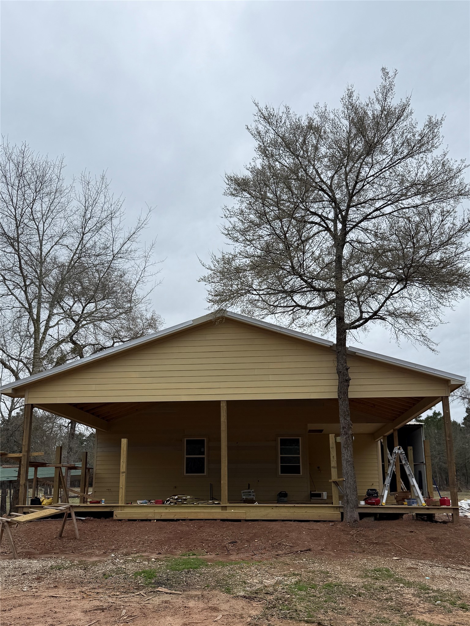 235 Flynt Road Huntsville, TX 77320 - Photo 5 of 25 a view of a house