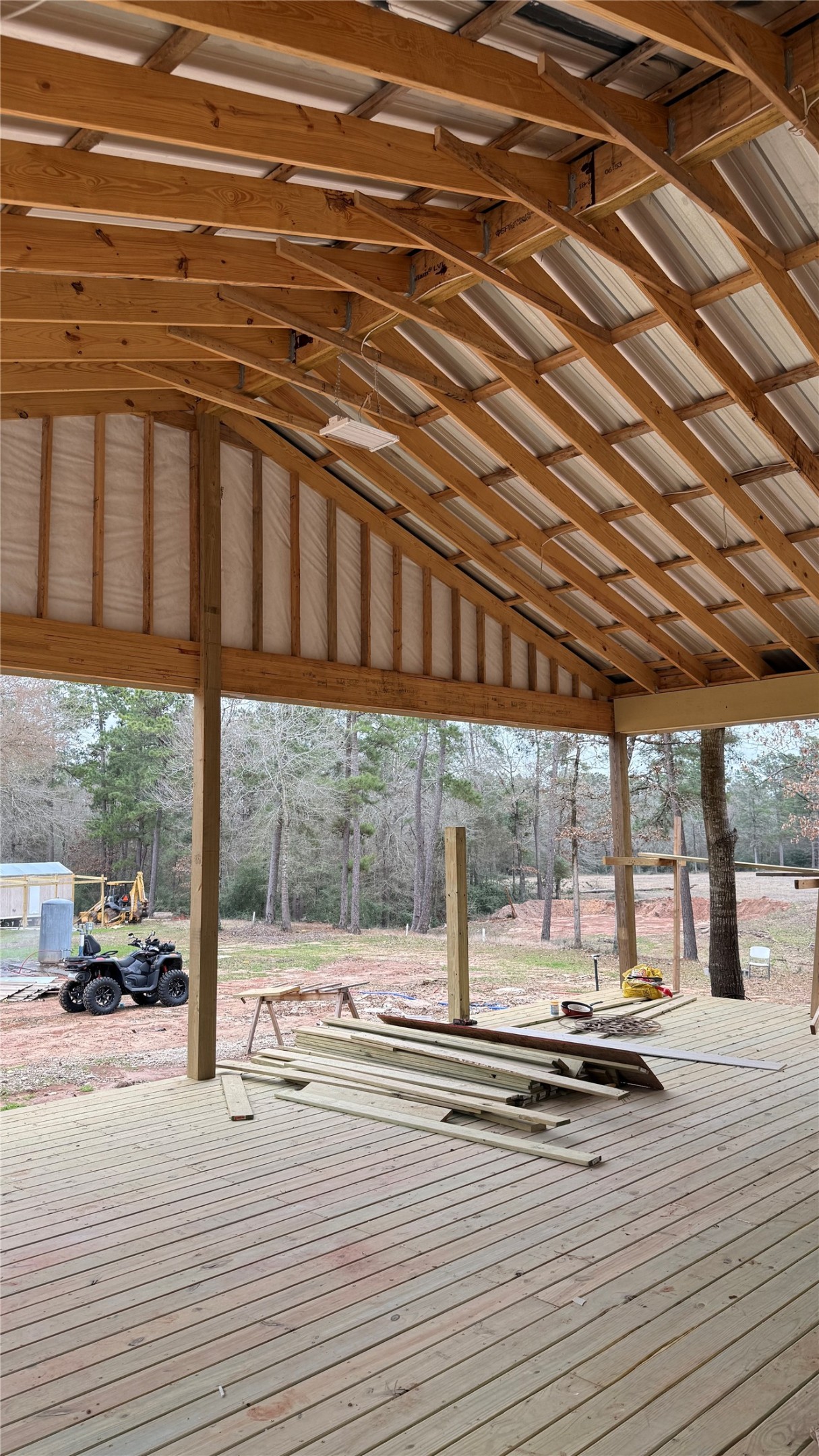 235 Flynt Road Huntsville, TX 77320 - Photo 9 of 25 a view of a swimming pool with outdoor seating