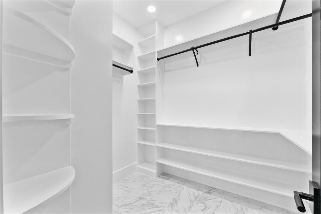 4717 Linnet Lane Dallas, TX 75209 - Photo 17 of 39 a view of walk in closet