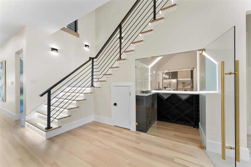 4717 Linnet Lane Dallas, TX 75209 - Photo 21 of 39 a view of entryway and hall with wooden floor
