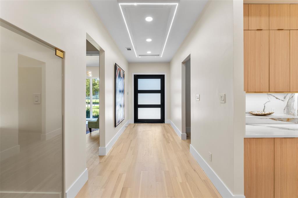 4717 Linnet Lane Dallas, TX 75209 - Photo 3 of 39 a view of entryway with wooden floor