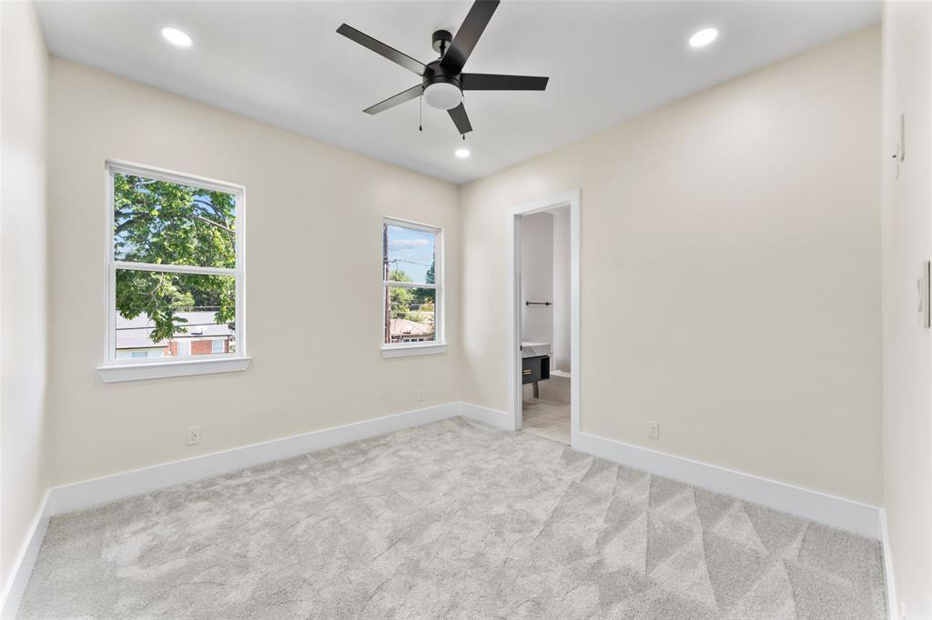 4717 Linnet Lane Dallas, TX 75209 - Photo 30 of 39 a view of a livingroom with a ceiling fan and window