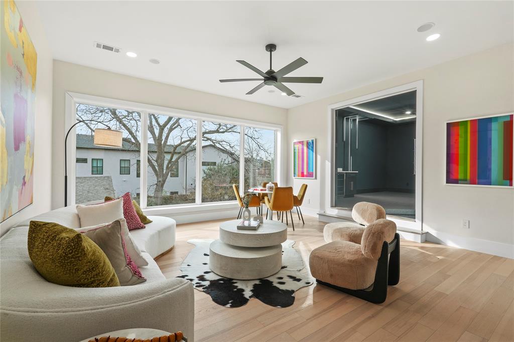 4717 Linnet Lane Dallas, TX 75209 - Photo 34 of 39 a living room with furniture and a large window