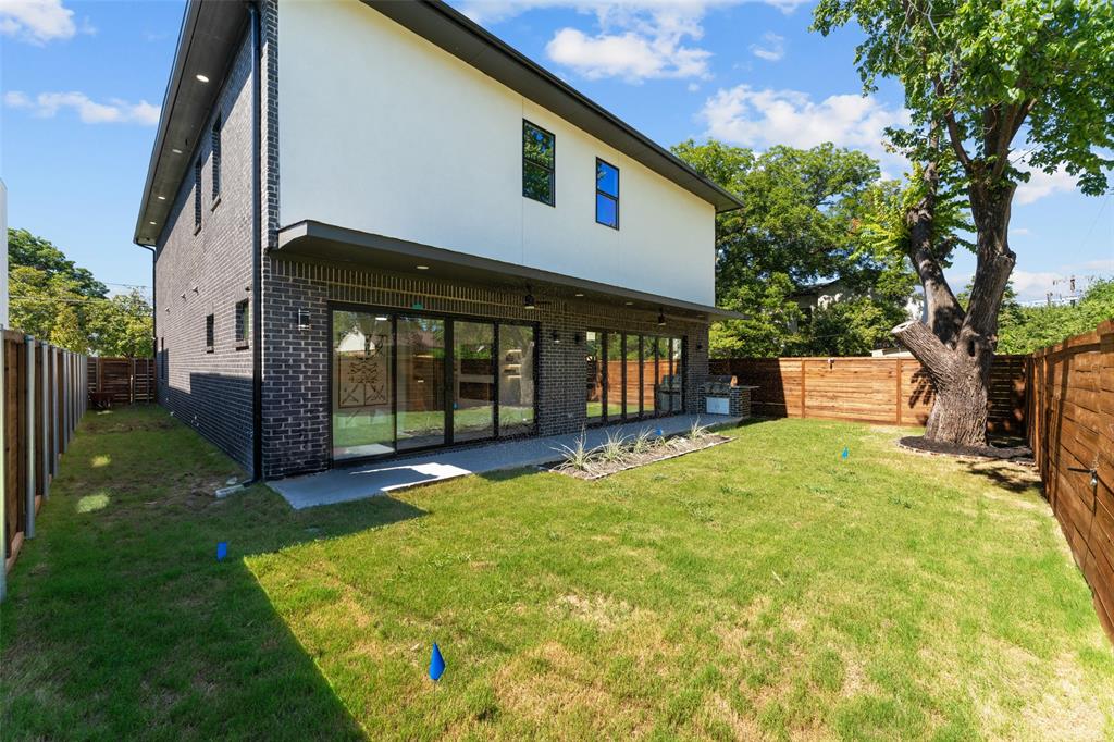 4717 Linnet Lane Dallas, TX 75209 - Photo 37 of 39 a view of a house with backyard and porch