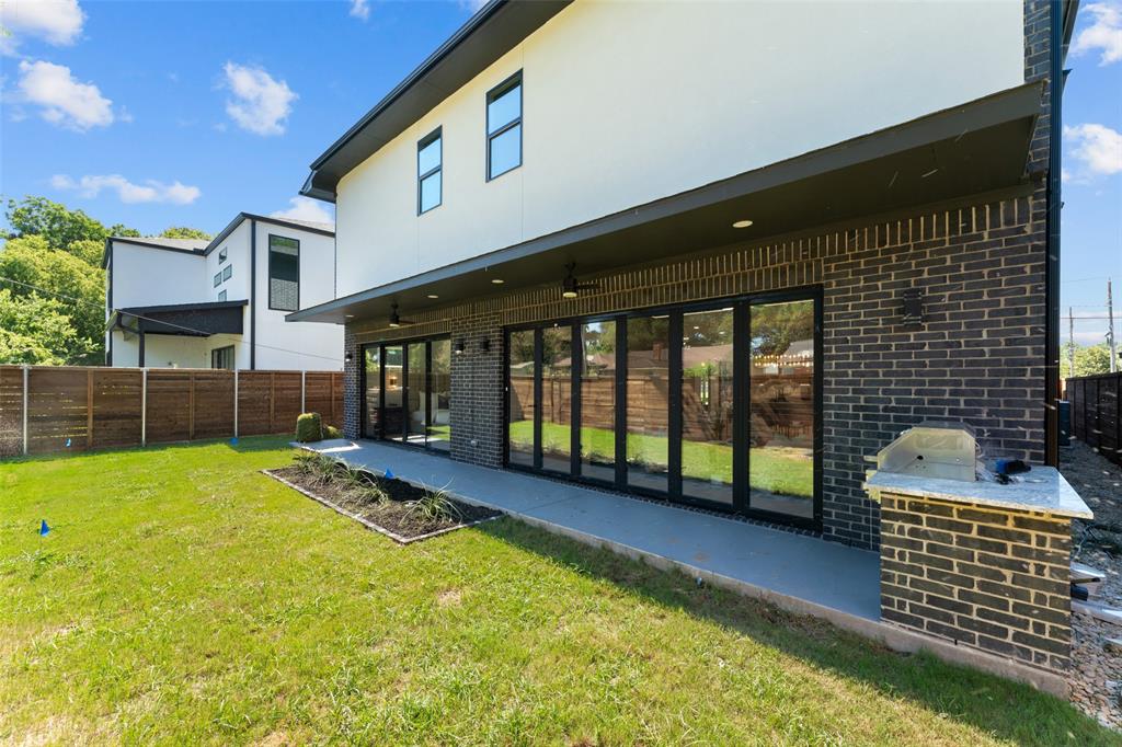 4717 Linnet Lane Dallas, TX 75209 - Photo 38 of 39 a view of backyard with swimming pool and deck