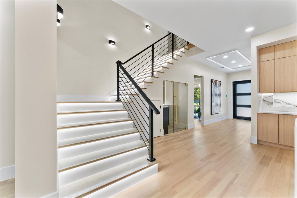 4717 Linnet Lane Dallas, TX 75209 - Photo 5 of 39 a view of entryway and hall with wooden floor