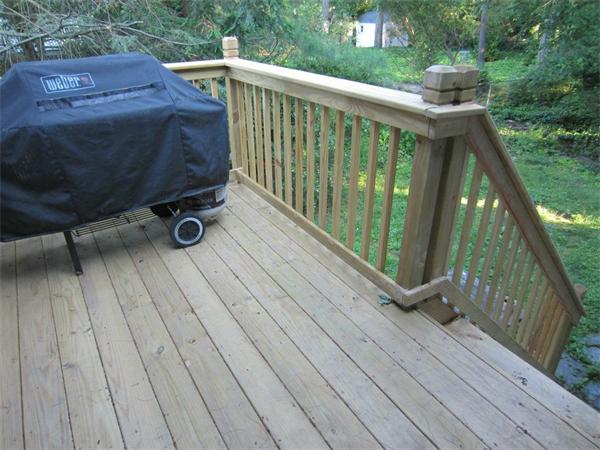 97 Sutton Road Needham, MA 02492 - Photo 11 of 11 a view of balcony with wooden floor and fence