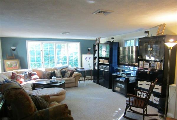 97 Sutton Road Needham, MA 02492 - Photo 5 of 11 a living room with furniture and a large window