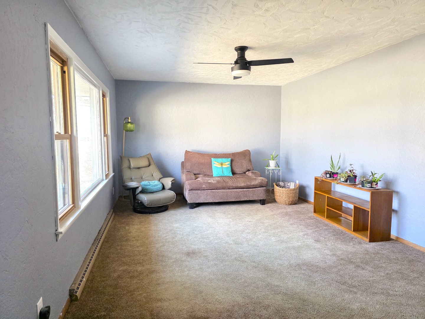 524 East Chestnut Street Geneseo, IL 61254 - Photo 2 of 39 a bedroom with furniture and a window