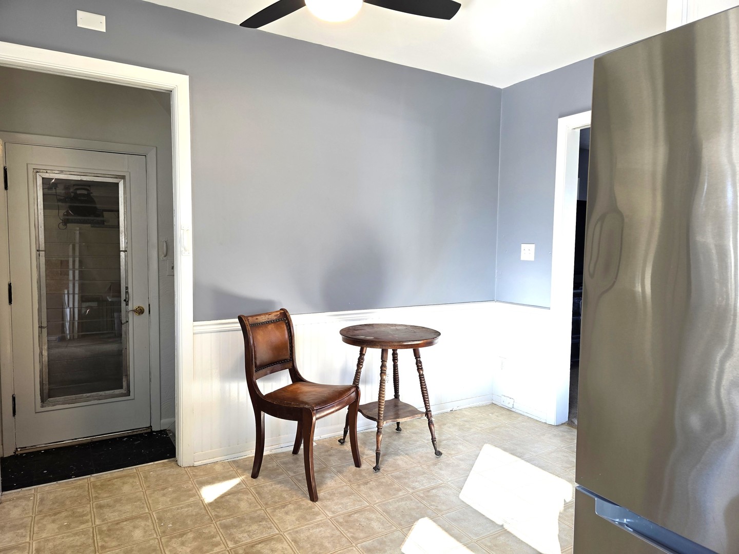 524 East Chestnut Street Geneseo, IL 61254 - Photo 24 of 39 a view of a livingroom with dining area and chandelier