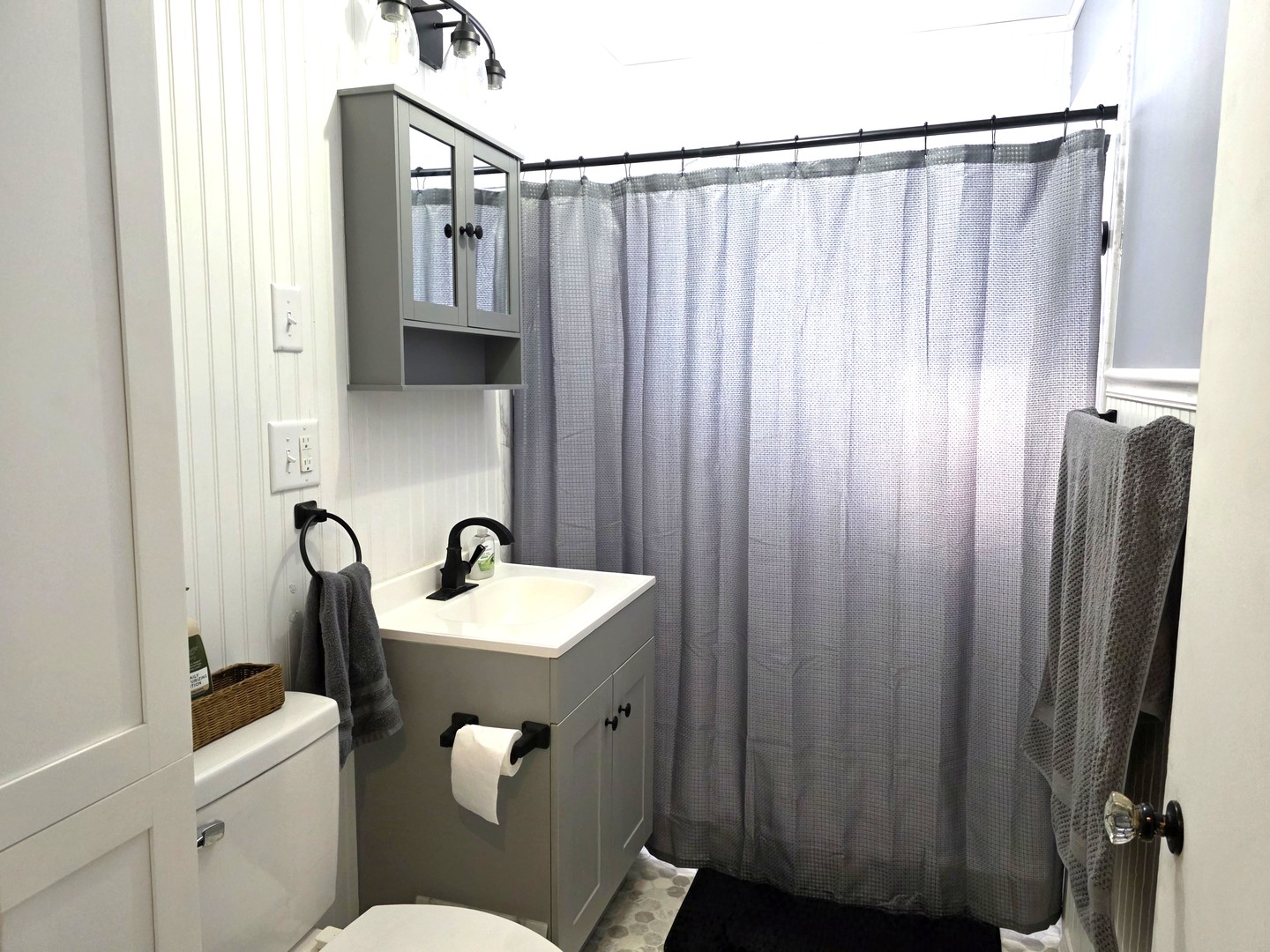 524 East Chestnut Street Geneseo, IL 61254 - Photo 6 of 39 a bathroom with a sink a toilet and shower