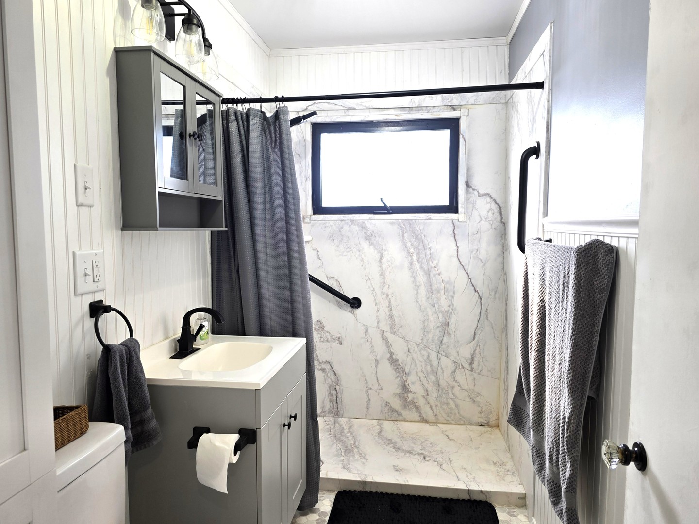 524 East Chestnut Street Geneseo, IL 61254 - Photo 7 of 39 a bathroom with a sink toilet and shower