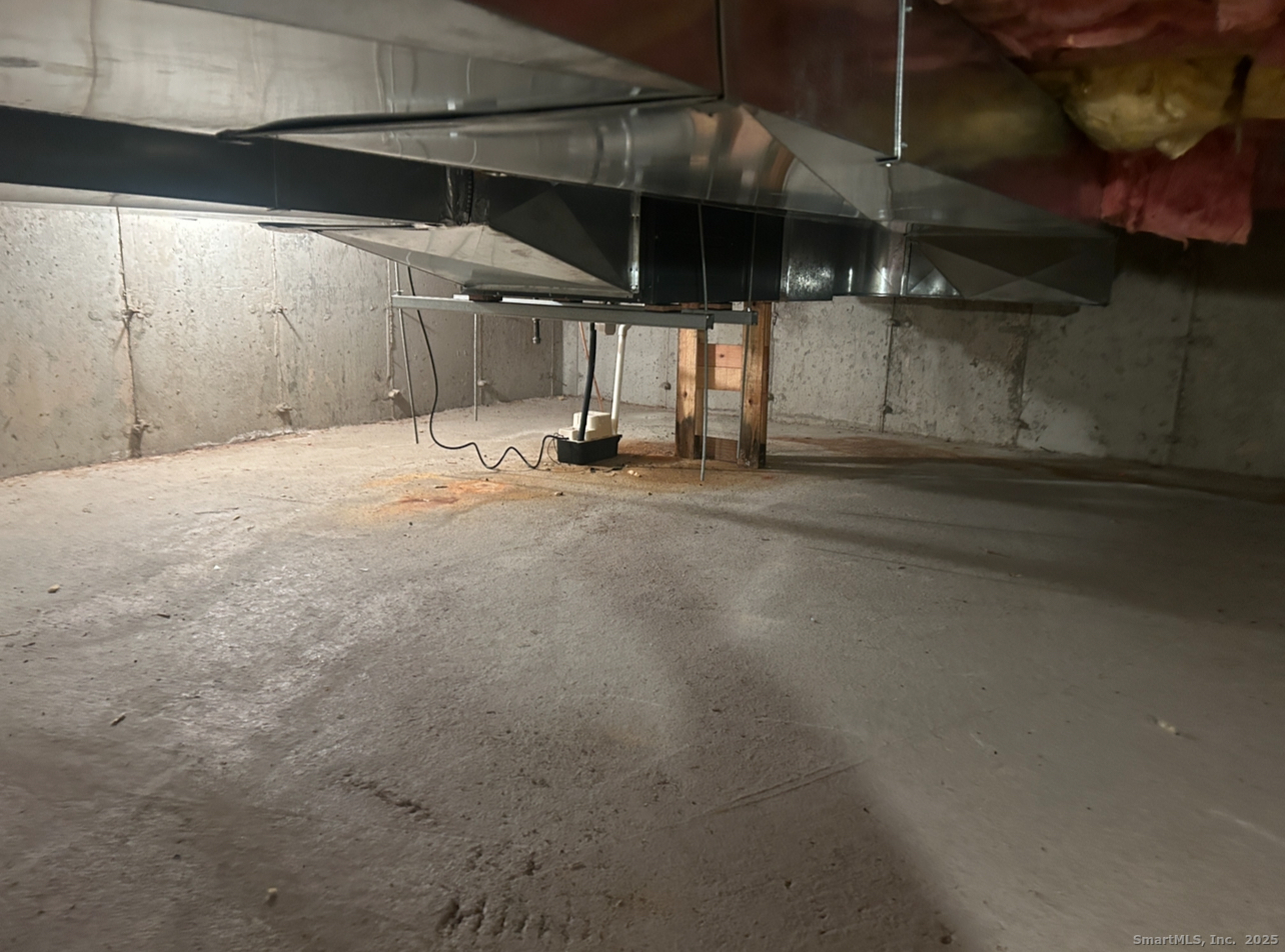 91 Forest Road, Unit B Milford, CT 06461 - Photo 24 of 28 a view of a indoor garage