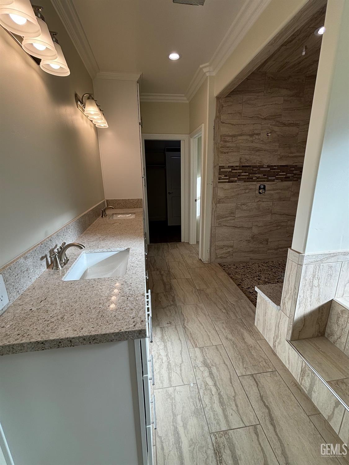 Undisclosed Address Tehachapi, CA 93561 - Photo 13 of 15 a bathroom with a granite countertop sink a toilet and shower