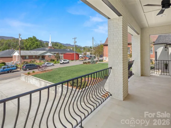 a view of a balcony with city view