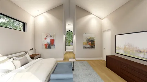 a bedroom with furniture and window