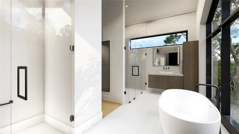 a bathroom with a sink a mirror and a bathtub
