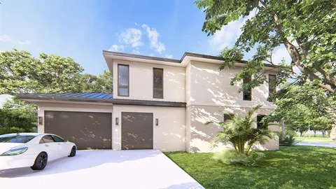 a house view with a garden space